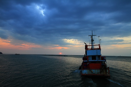 A boat sailing into the sea