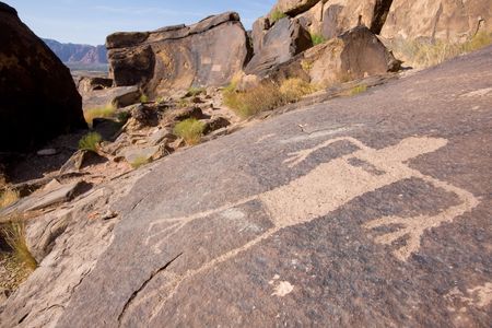 Petroglyphs carved onto rock surface by prehistoric Native American(s) at Anasazi Canyon, Utah, USAの写真素材