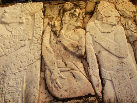 Depiction of possible prisoners of war carved out of limestone at the ancient Mayan city of Palenque, Chiapas, Mexico.の写真素材