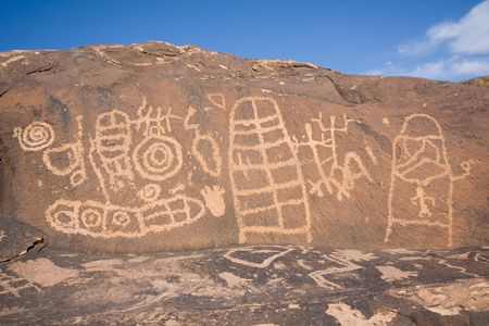Petroglyphs carved onto rock surface by prehistoric Native American(s) at Anasazi Canyon, Utah, USAの写真素材
