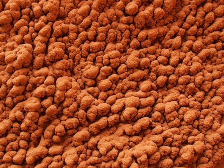 Abstract view of mud formations on underside of cliff.の写真素材