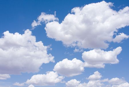 View of blue sky and clouds on summer day.の写真素材