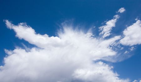 View of blue sky and clouds on summer day.の写真素材