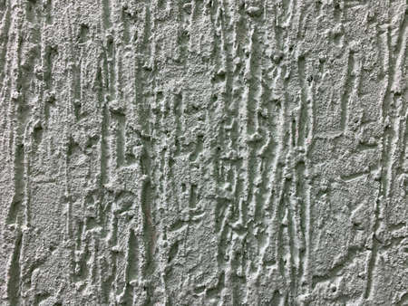 Light green, mint color rough concrete textured wall, backgroundの写真素材