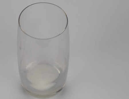 Milk is a pale liquid produced by the mammary glands of mammals.I focus on the glass edgeの写真素材