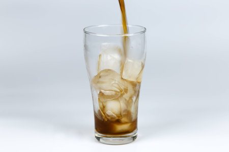 Cold cola in a glass.