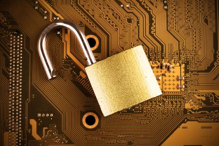 motherboard lock, electronic data protection concept, soft focus. tonedの写真素材