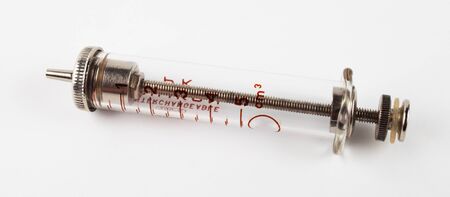 Glass reusable syringe on a white background, close-upの写真素材