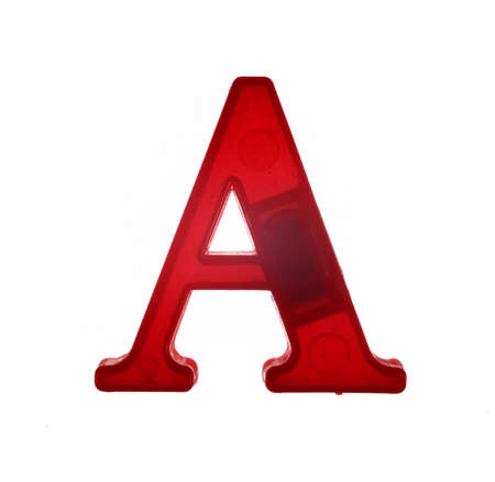 Plastic letter A on magnet isolated on white background, top viewの写真素材