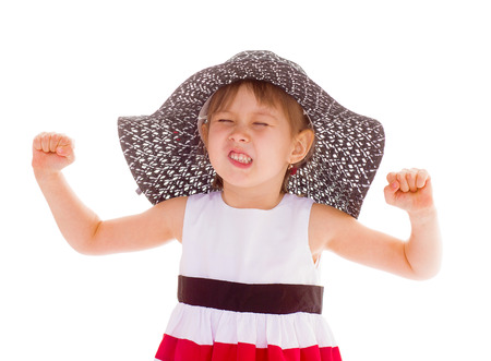 young girl with hat. Isolated on white background.の写真素材