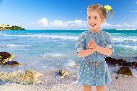 Happiest girl on the background of the sea.の写真素材