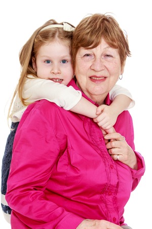 Happy grandmother with her little granddaughter - isolated on white backgroundの写真素材