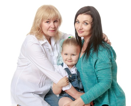 Adorable little girl in the arms of grandmother and beloved mother - Isolated on white background