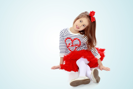Little girl in red dressの写真素材