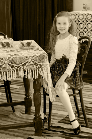 Little girl drinking tea.の写真素材