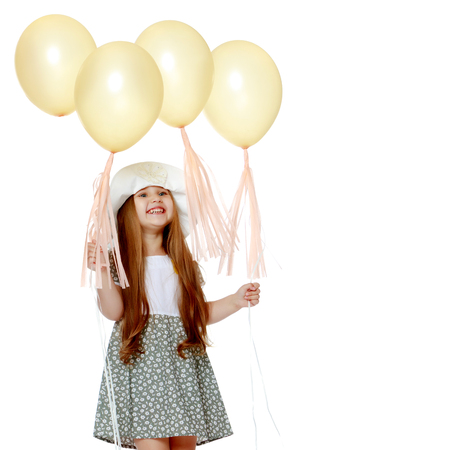 Little girl in a hat.の写真素材