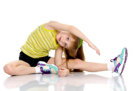 The gymnast perform an acrobatic element on the floor.の写真素材