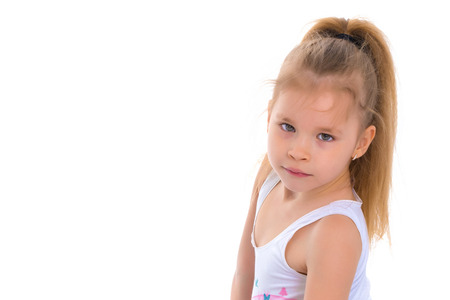 Little girl in a white T-shirt.の写真素材
