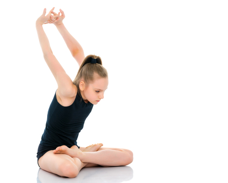 The gymnast perform an acrobatic element on the floor.の写真素材