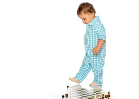 Little boy playing chessの写真素材