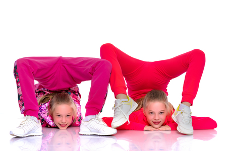 Girls gymnasts perform exercises.の写真素材
