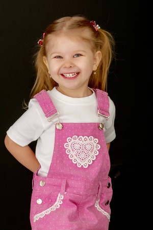 Beautiful little girl laughing.