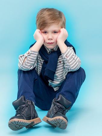 The little boy frowned.の写真素材