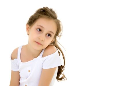 Little girl in a pure white T-shirt for advertisingの写真素材