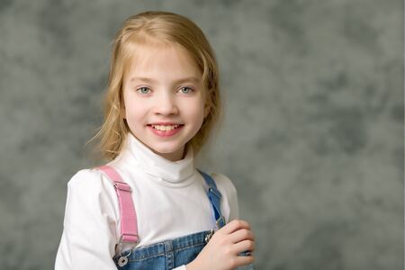 Portrait of a little girl close-up.Isolated on white background.