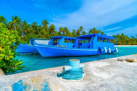 Yacht near the pier of a fabulous island in the Maldives.の写真素材