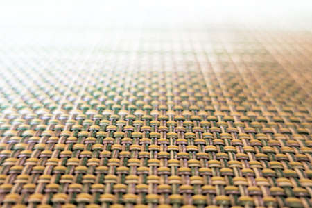 close-up of beige fabric plastic lattice, grid texture patternの写真素材