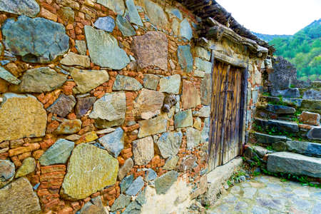 Ancient Stone Wall Made of Natural Rough Stones, Old Masonry