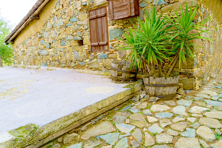 Ancient Stone Wall Made of Natural Rough Stones, Old Masonryの写真素材