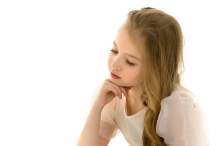 The little girl thinks.Isolated on white background.