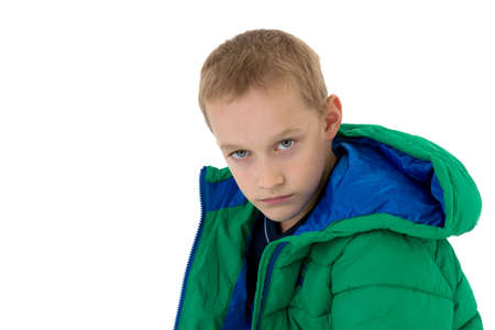Stylish boy posing in winter jacket
