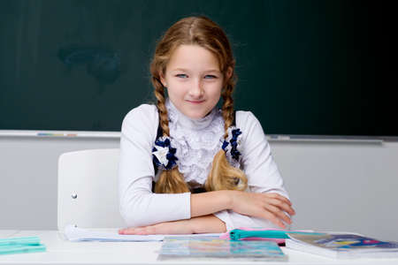 Portrait of cute schoolgirl.Back to school, education concept.