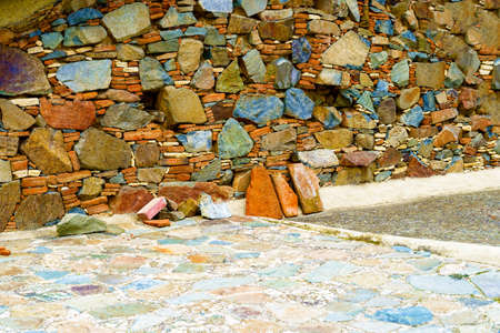 Ancient Stone Wall Made of Natural Rough Stones, Old Masonryの写真素材