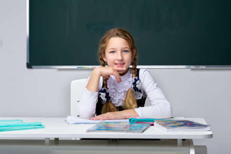 Portrait of cute schoolgirl.Back to school, education concept.