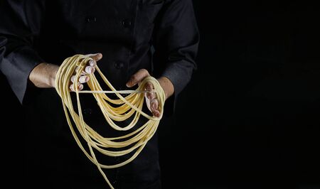 Female chef making fresh noodles