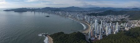 Panorama of an urban coastal city (Balneario Camboriu, Brazil)の写真素材