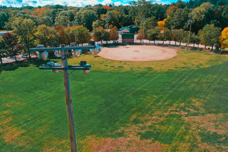 Aerial Drone Photography Of A Baseball Field In Downtown Bedford, NH (New Hampshire) During The Fall Foliage Seasonの写真素材