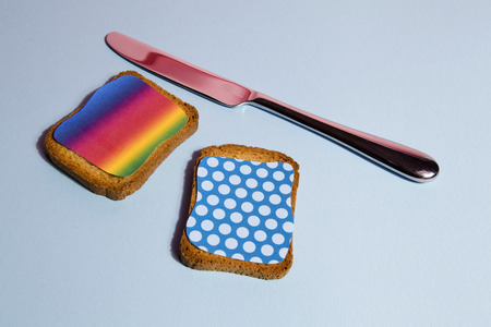 pattern impression on a rusk for breakfast
blue backgroung and black shadowの写真素材