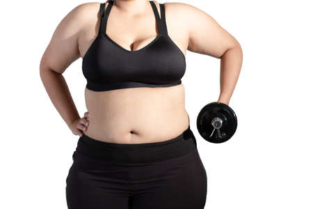 Fat women lifting weights wearing black sports clothing aganist a white backgrounds