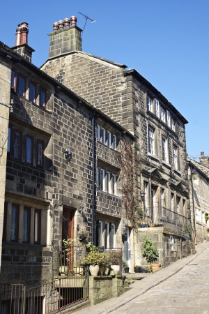 Traditional weavers cottages on a cobbled street in Heptonstall, Yorkshireのeditorial素材