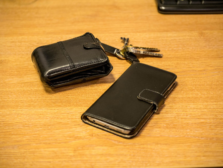 Wallet, keys and phone, things you must not leave home withoutの写真素材