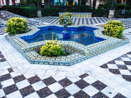 Fountain and tiled pool and pathways in Cadiz, Spainのeditorial素材