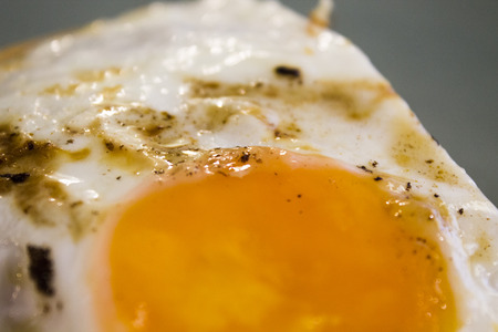 Delicious food with fried egg and pancakes and bacon