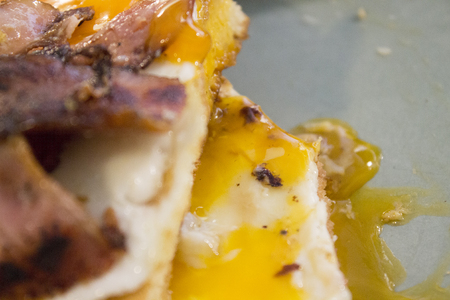 Delicious breakfast with fried egg pancakes and baconの写真素材
