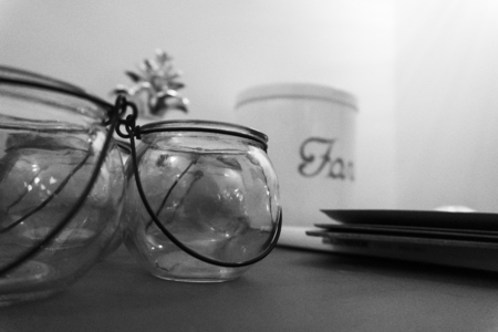 glass container with metal hookの写真素材