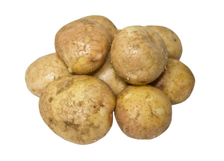Raw potatoes isolated on whiteの写真素材